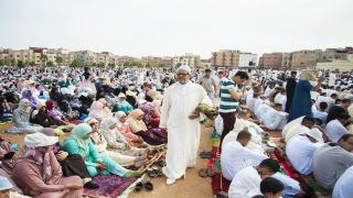 SALE, MOROCCO - JUNE 26 : Moroccan Muslims gather to perform Eid al-Fitr prayer in Sale, Morocco on June 26, 2017. Eid al-Fitr is a religious holiday celebrated by Muslims around the world that marks the end of Ramadan, Islamic holy month of fasting. (Photo by Jalal Morchidi/Anadolu Agency/Getty Images)