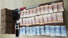 اعتقال 3 اشخاص و حجز 43 مليون سنتيم و 11 كلغ من الحشيش بأكادير