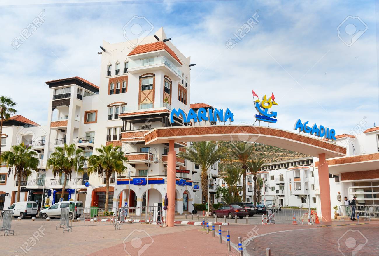 Agadir. Morocco - December 23, 2016: Beach promenade and entrance to the marina in Agadir city